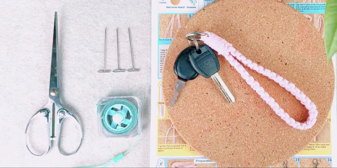 A finished pink macrame wristlet keychain with car keys on a round cork board, with scissors, measuring tape, T-pins and the kit's printed tutorial booklet on a cozy beige worktable